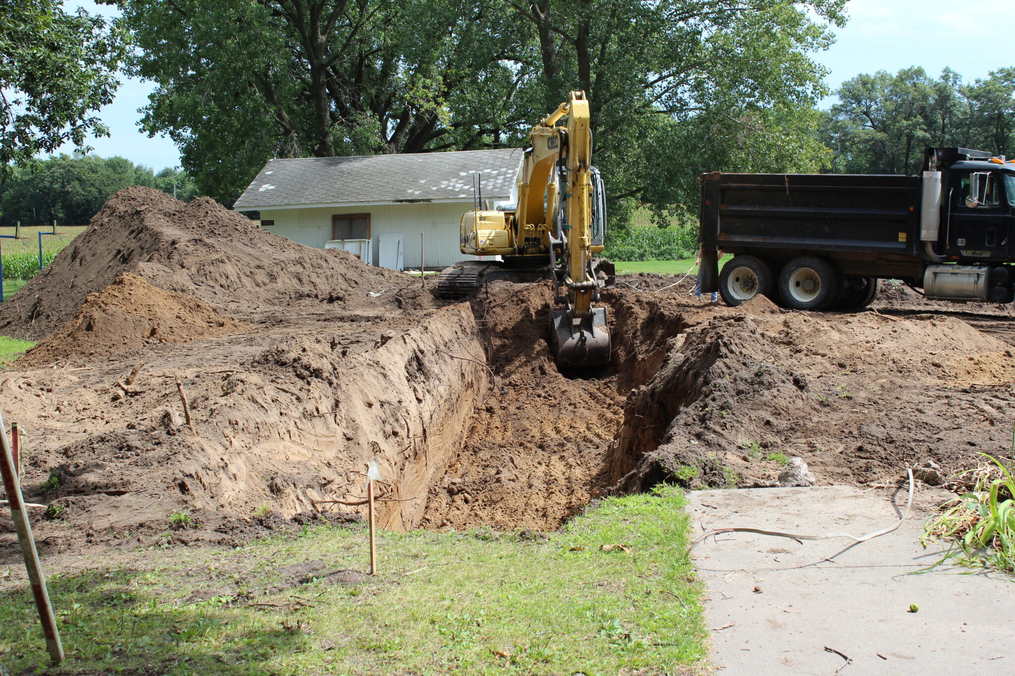 DIGGING THE STORM SHELTER | NEICSC